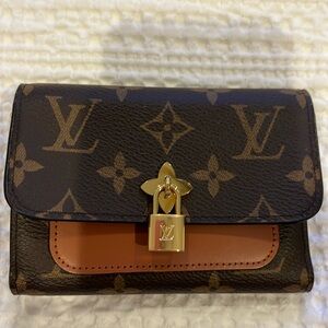 Louis Vuitton Compact Flower Caramel wallet. 5 inches wide, 3 3/4 inches tall.